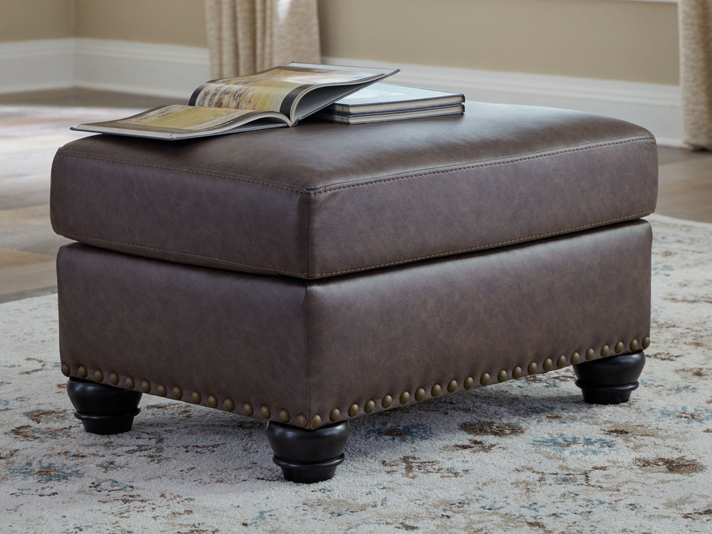 This ottoman marries classic character with a contemporary attitude. Love the timeless look of leather? Its take on deep brown faux leather is versatile enough to pair with styles from traditional to modern, at a price that wonâ€™t break the bank. Details