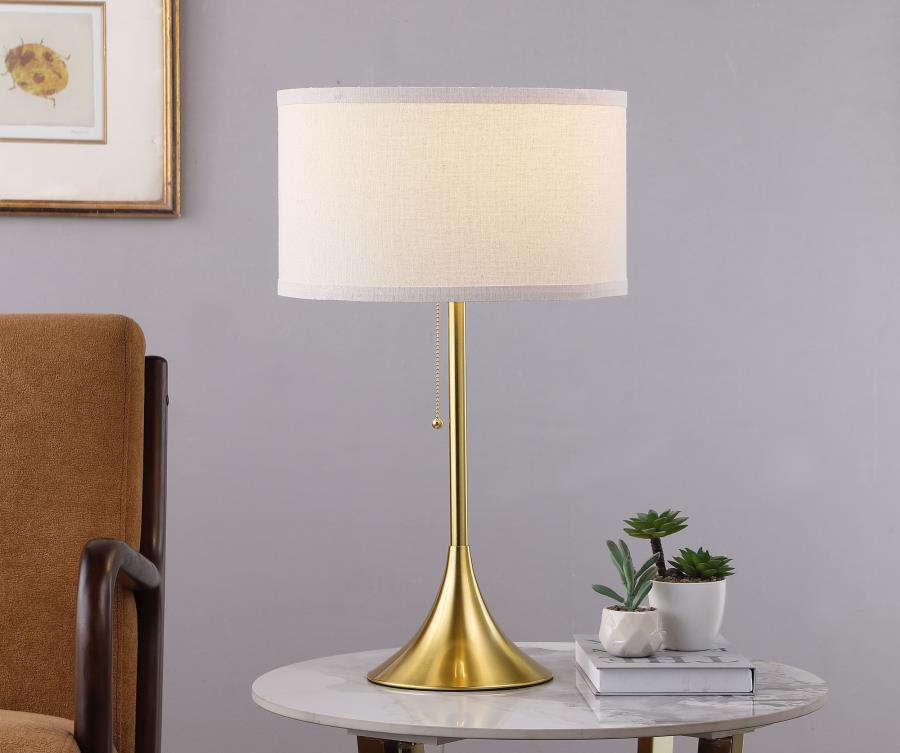 Sleek style takes center stage in a gleaming modern table lamp. Offering a refined silhouette, it features a pedestal base with a gold finish that offers timeless, neutral appeal in any living area or bedroom. The lamp boasts a pull chain for easy, timele