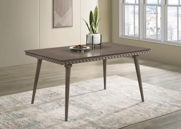  adding a textural contrast to the smooth tabletop. Constructed with a blend of solid wood