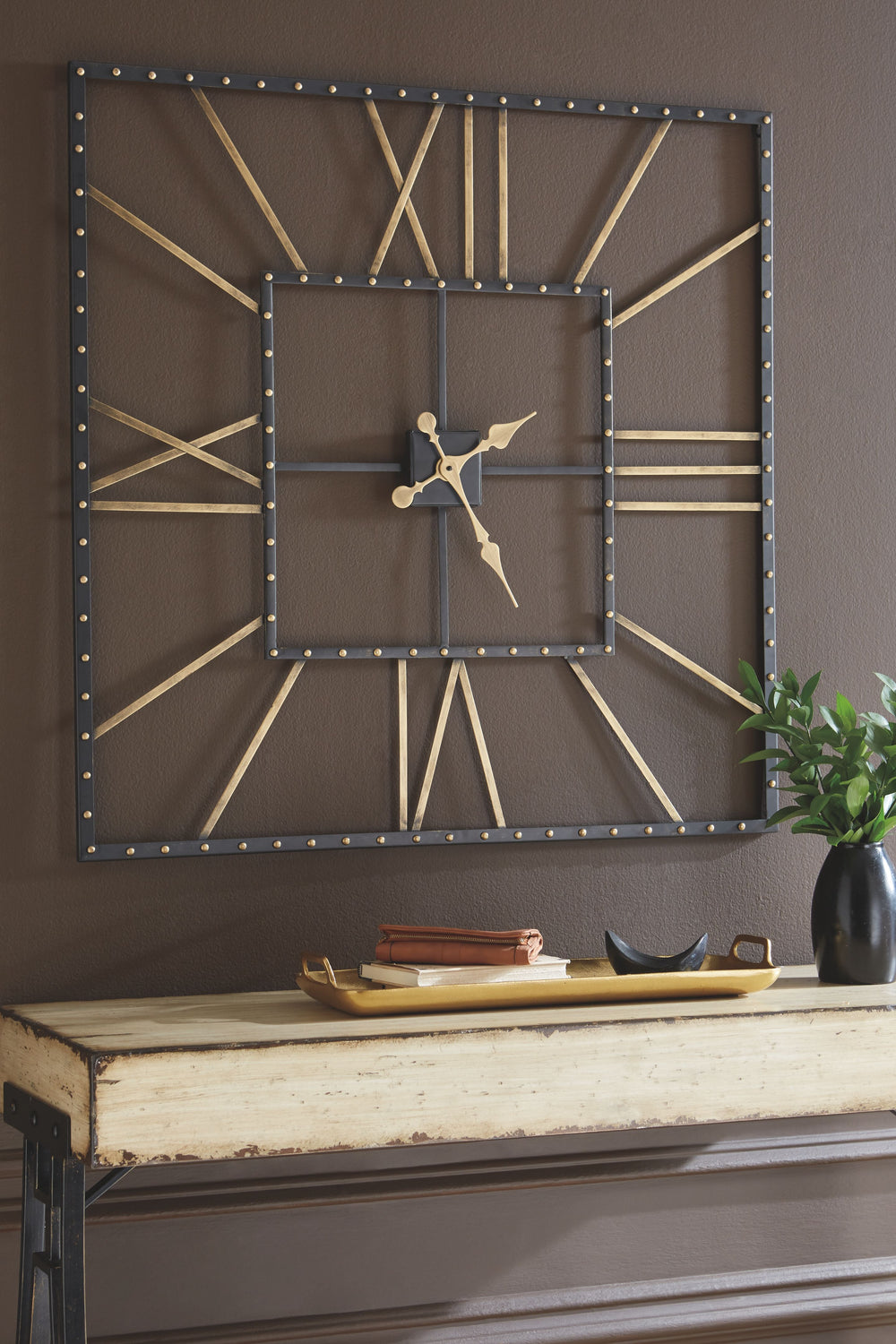 A huge clock, especially one that-'s unique, is an easy way to incorporate casual design into a room-'s decor. With this square wall clock, you-'ll always know what time it is. The openwork design cleverly incorporates a Roman numeral clock face with trad