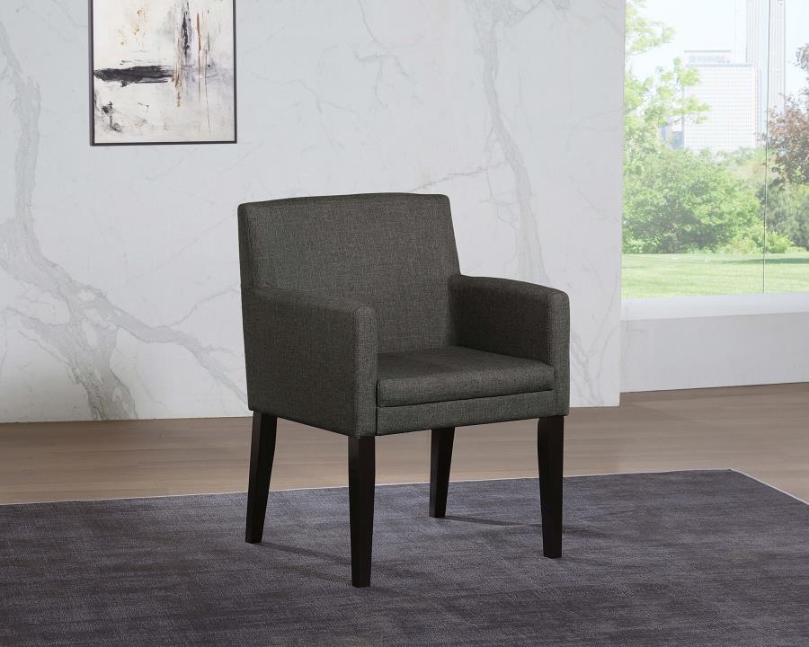Enhance your casual dining room with these stylish mid-century-inspired dining chairs. Featuring cushioned arms wrapped in durable charcoal grey fabric, they offer both comfort and style. The sleek design and versatile color effortlessly complement any di