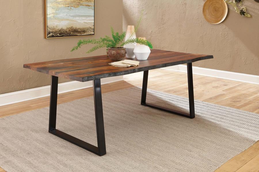 Revel in the light, airy design influence of this wood and metal dining table. Grey sheesham wood finishing ensures a rich, dimensional look perfect to elevate any dining space. A wide rectangular tabletop is perfect for seating six for a scrumptious holi