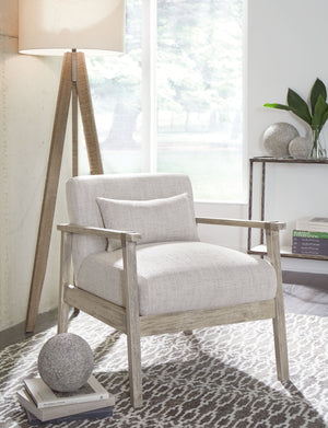  while light neutral upholstery in a herringbone pattern creates textural interest. Antiqued pewter-tone accents add a touch of urban f