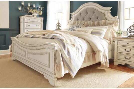 Realyn Queen Upholstered Panel Cal King Bed 